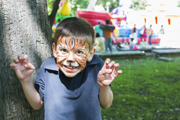 Child with painted face - 52922875
