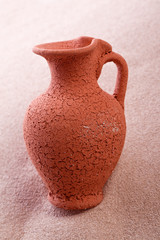 old amphora on a bright beach
