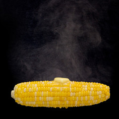 Steaming corn with melting butter (Clipping path on the corn inc