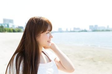 Beautiful asian woman on beach summer holiday