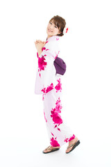 Beautiful young woman wearing japanese traditional kimono