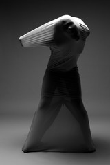 Scary Horror Image of a Woman Trapped in Fabric