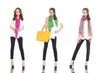 full length young woman with scarf and bag posing