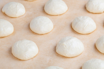 Fototapeta na wymiar Small balls of fresh homemade pizza dough