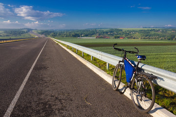 Fototapeta na wymiar bicycle on a asphalt road