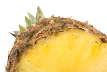 Juicy pineapple with slices isolated on white background