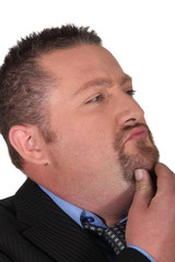 Man scratching his chin