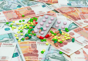 medical drugs on the background of banknotes