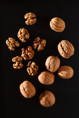 walnuts on black background