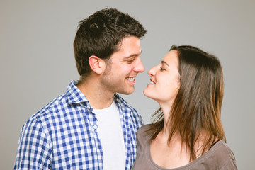 Portrait of a beautiful young happy smiling couple