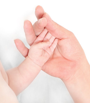 Helping hand. Picture of mothers and baby hand.