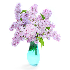 Bunch of flowers in glass vase. The Common Lilac.