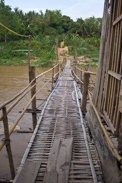 Bamboo bridge for crossing Kan river in Laung Prabang