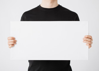 man with blank white board