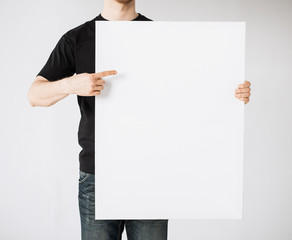 man with blank white board