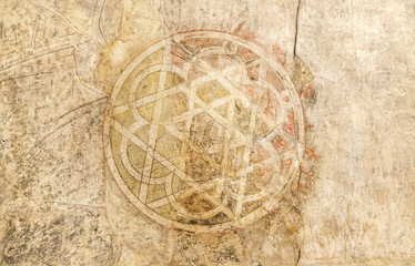 Ancient Arabic symbol painted on the wall