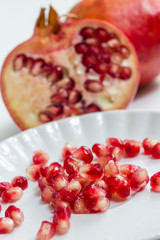 eating a pomegranate
