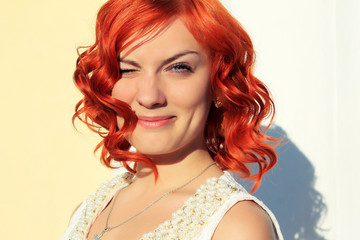 Naklejka premium beautiful red-haired girl