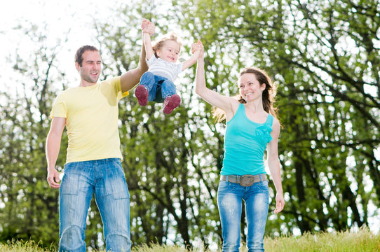 happy family having fun outdoors