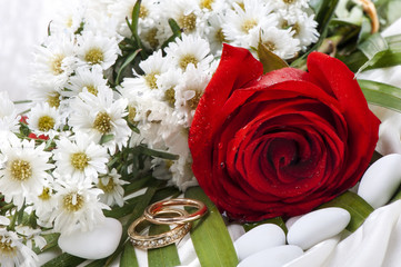  roses and wedding rings