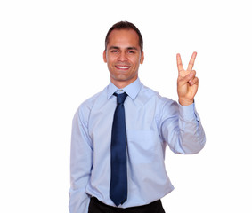 Adult man smiling and showing you victory sign