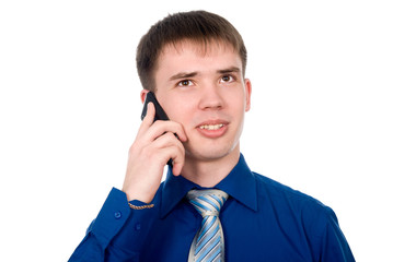 A young man talking on the phone.