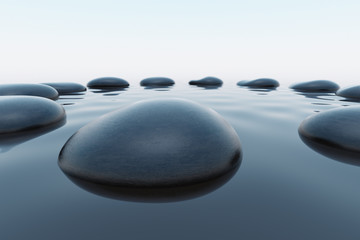 Fototapeta na wymiar Pebbles in water.