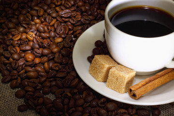 Coffee beans and white cup