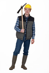 Man stood with pick-ax