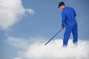 Photomontage of a worker on a cloud