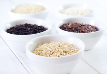 Different kind of raw rice, raw rice in the white bowls