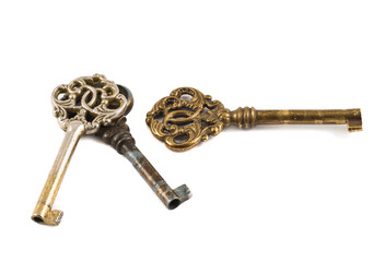 Old decorative metal keys isolated