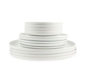Pile of clean white dish plates isolated