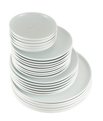 Pile of clean white dish plates isolated