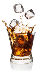 Cola in glass with falling ice cubes on white. With clipping pat