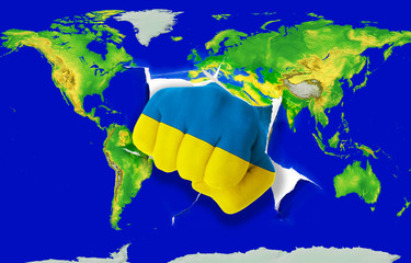 Fist in color  national flag of ukraine    punching world map