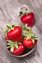 Fresh strawberries on wooden table