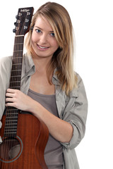 Woman playing guitar