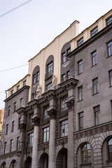 Fototapeta na wymiar Facade with columns, sculptures and windows