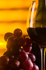 grape and glass with red wine