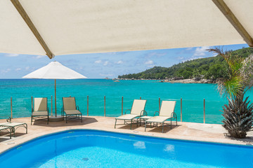 Fototapeta na wymiar Generic Outdoor resort pool in Seychelles tourist island