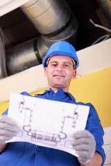 Engineer with a heating plan