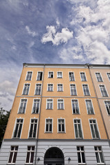 Fototapeta na wymiar East Berlin Low Angle Building and Cloudy Sky