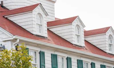 Three Dormers on Red Roof