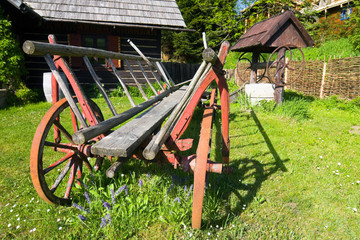 old wood coach wheel