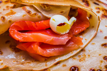 pancakes with smoked salmon and butter on Shrovetide