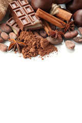 Fototapeta na wymiar Composition of chocolate sweets, cocoa and spices, isolated