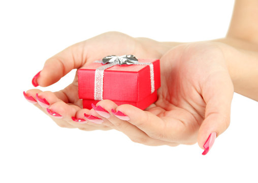 Female hands with gift box, isolated on white
