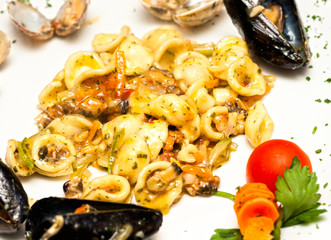 Tasty Orecchiette pasta with mussels, clams and vegetables.
