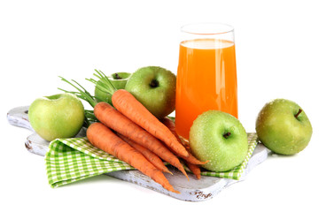 Glass of juice, apples and carrots, isolated on white